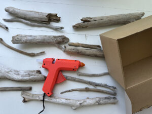lavoretti-diy-bambini-cornice-legnetti-mare-materiali