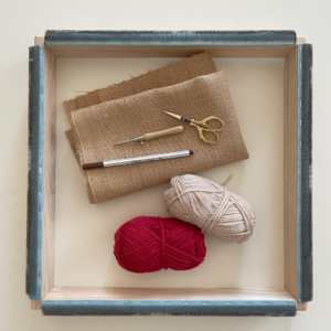 materiali per ghirlanda natalizia con la tecnica del punch needle