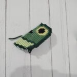 ricamare a punto annodato i bordi della rana 